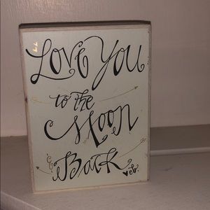 “love you to the moon and back” shelf sign